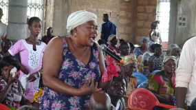 Local Business Woman expresses her concerns during a Townhall meeting in Ejura.jpg